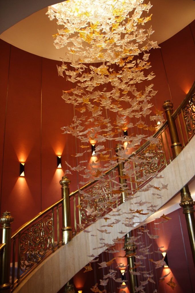 Stairway and chandelier at Montien Hotel Surawong Bangkok 