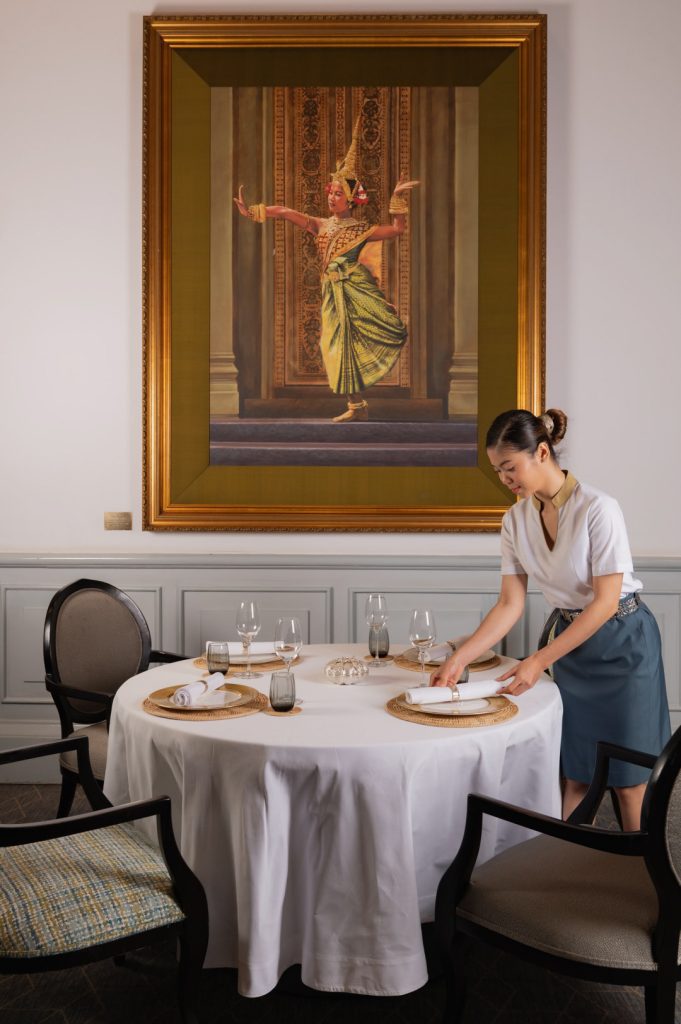 servant at Restaurant Le Royal