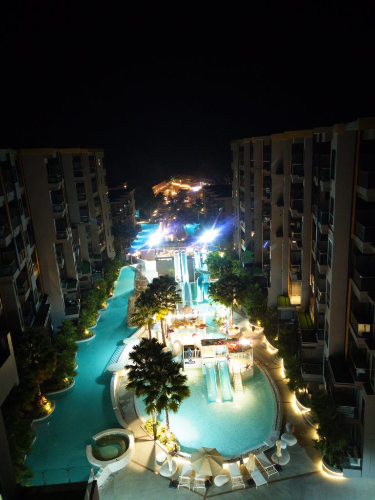 Lagoon Pool and Aqua Play Zone illuminated pools at night