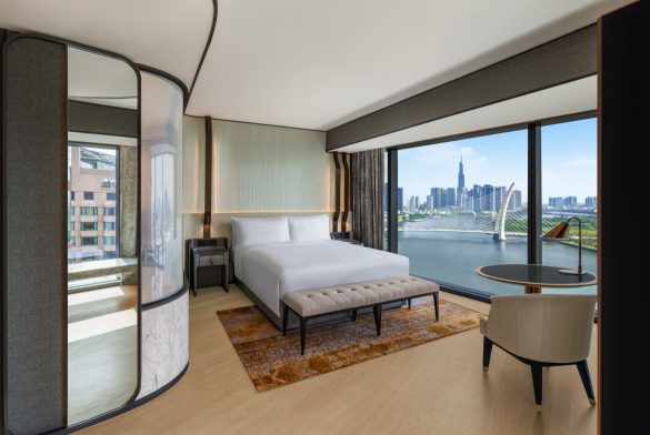 Hilton Saigon king deluxe corner suite river view. © Hilton 2024