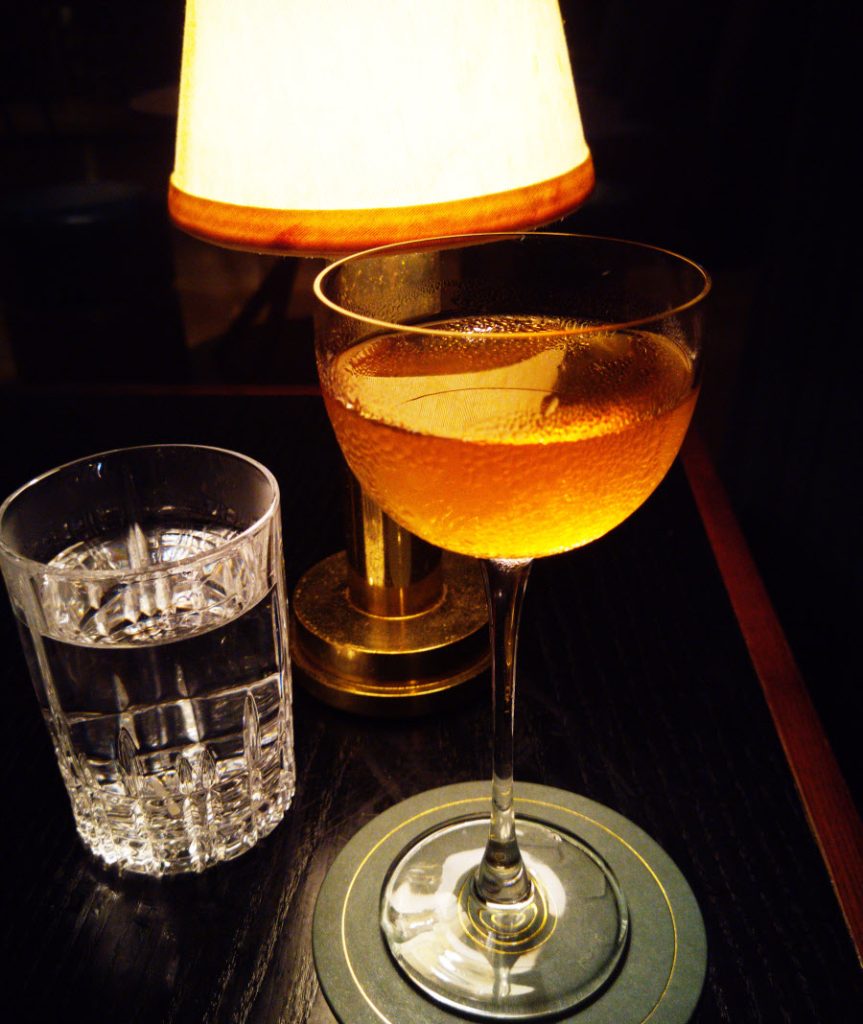 Origin bar, water and cocktail