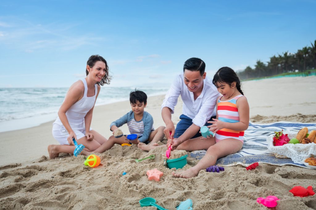 family on beach, Radisson Blu Resort Cam ranh
