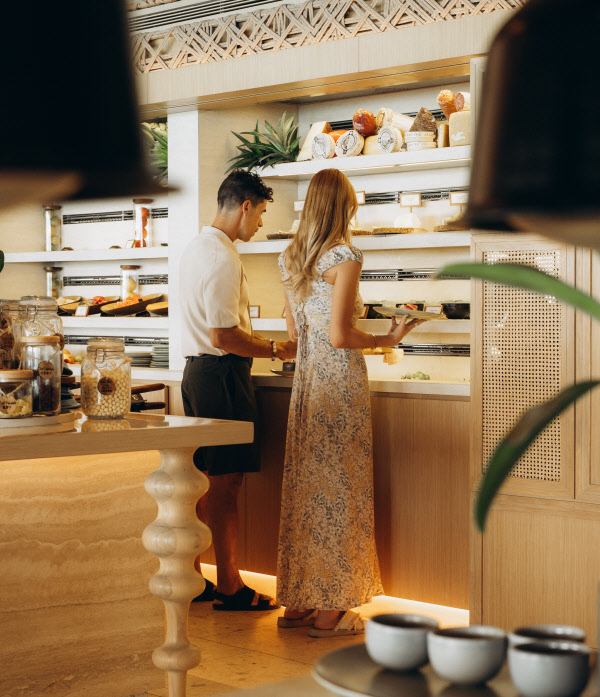 Couple selecting breakfast at Aow Thai